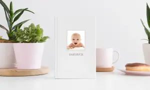 Kreatives Fotobuch mit Baby als Hardcover Einband gestalten